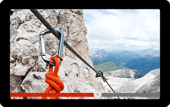 Screen showing a video of climbing with rope and carabiner